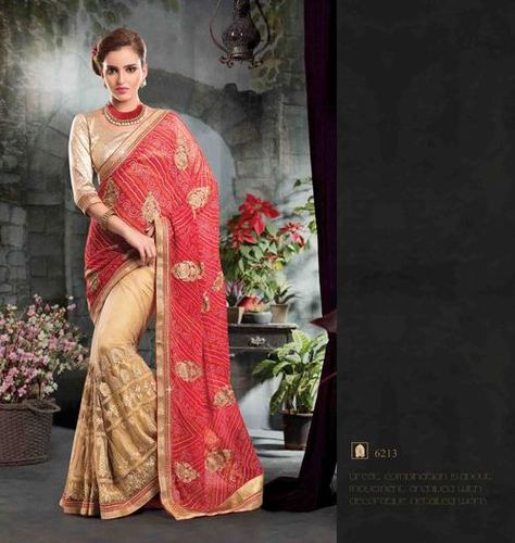 Heavy embrodiery skirt with bandhani print pallu Saree