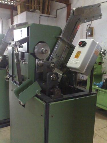 Single spindle knurling machine