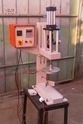 pneumatic-cap-foil-sealing-machine