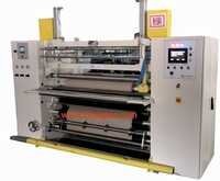 Cream Shaft Less Slitting & Rewinding Machine For Making Plotter Paper Rolls.