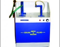 Ampoule filling $ sealing device