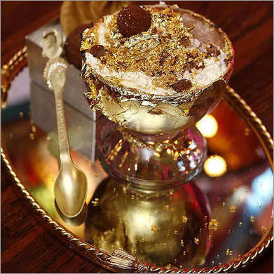 Gold leaf on pudding Frozen Haute Gold leaf on pudding Frozen Haute