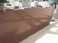 Jhansi Red Granite - Thickness 15-20 Mm, Polished Surface Finish | Crack-resistant, Stylish Red Color, Ideal For Flooring & Countertops 