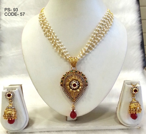 Antique Pendant Set - Copper Alloy , Beautifully Designed with Mesmerizing Patterns and Jhumka Style