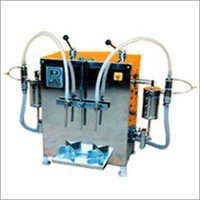 Semi Automatic Twin Head Liquid Filling Machine - Stainless Steel, Compact Size , User Friendly Operation, Rigidness, Less Power Consumption