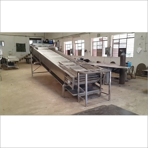 Mango Loading roller conveyor and washer
