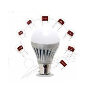 Metallized Polyester Film Capacitor - Polypropylene Film, Compact Size for Lighting Ballasts, Red Color, Low ESR and ESL Values, Flicker Free Lighting