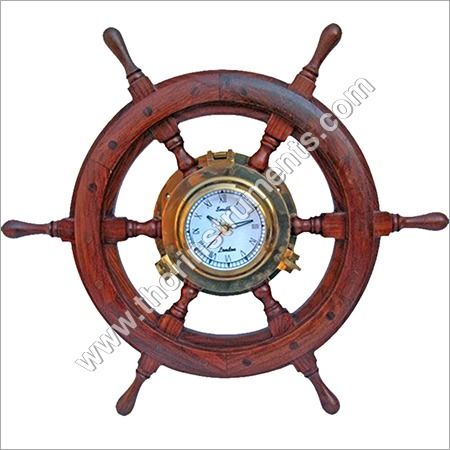 https://cpimg.tistatic.com/03404665/b/6/Collectible-Nautical-Brown-Ship-Wheel-Clock.jpg