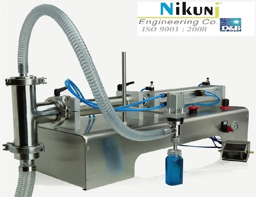 Manual Round Liquid Filling Machine