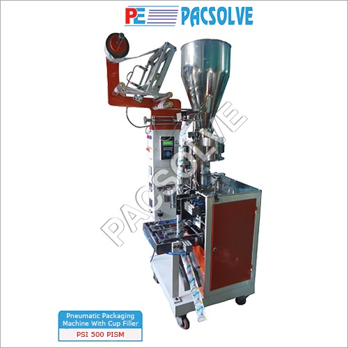 PNEUMATIC PACKAGING MACHINE WITH CUP FILLER