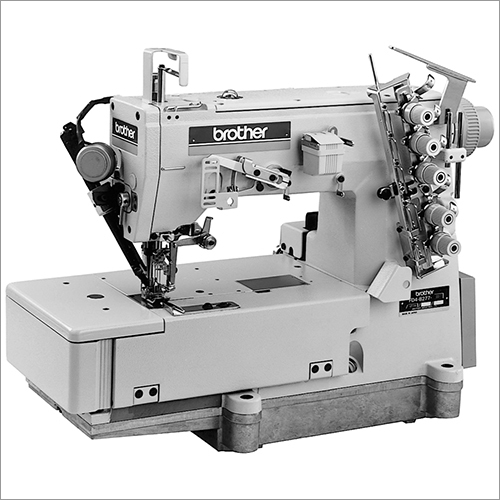 Flat Bed Top And Bottom Covering Stitcher With Thread Trimmer