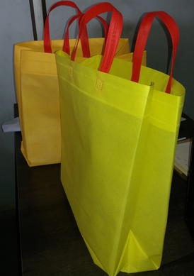 Loop Handle Bag - Non Woven, 10x10 to 16x16 Inch Sizes, Customized Color, Soft Texture, Translucent Design, Flexiloop Handle Style