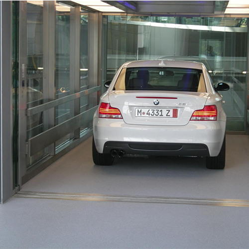 Auto Door Car Elevator - Stainless Steel, 6 Meter Dimensions | 5000 Kg Load Capacity, 2.7 Meter Lifting Height, Safety Sensor