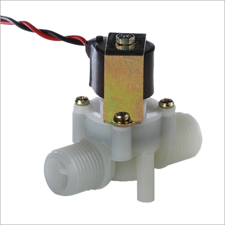Normally closed and magnetically latching solenoid