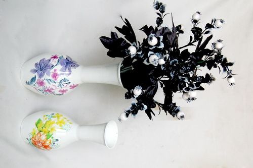 flower vase with hand painted work made of iron