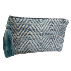 DARI CLUTCH WITH TASSEL