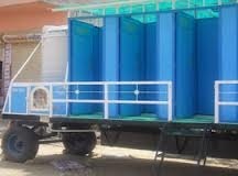 White And Blue 4 Seater Mobile Toilet Van