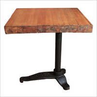 Cast Iron and Natural Wood Table