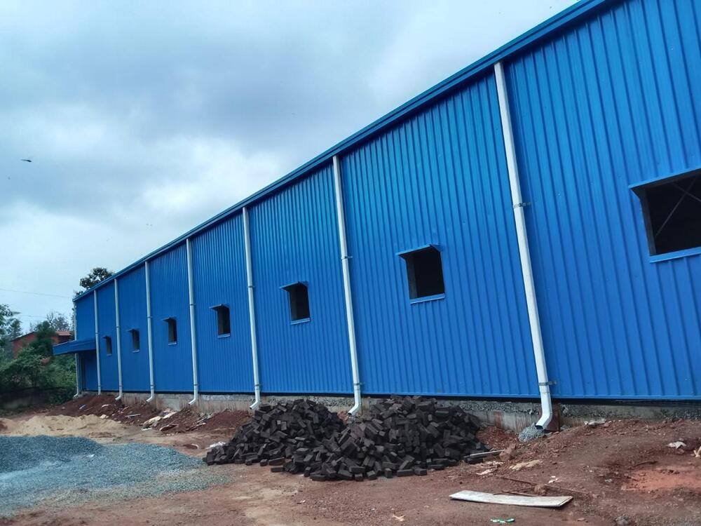 Robust Pre Engineered Building - Steel Material, 25 Years Life Span, Custom Color | Roof Live Load As per Design, .50 Wall Panel Thickness, Ideal for Various Doors and Windows