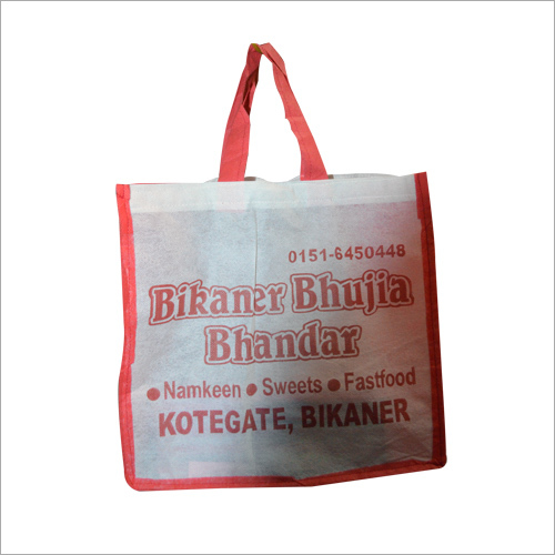 Non Woven Sweet Bag - Non Woven Fabric, Variable Dimensions, Red | Durable, Moisture Resistant, High Tear Strength, Soft Texture, Reinforced Handles