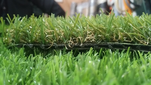 Machine for artificial online grass