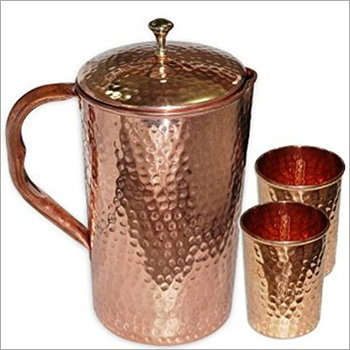 Copper Hammered Jug And Hammered Glasses