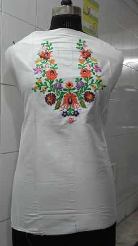 white kurta with multi col embroidery