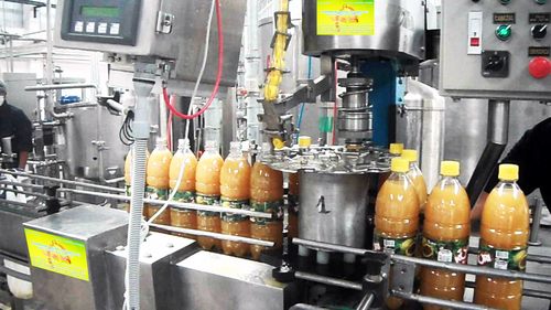 AUTOMATIC JUICE FILLING CAPPING MACHINE