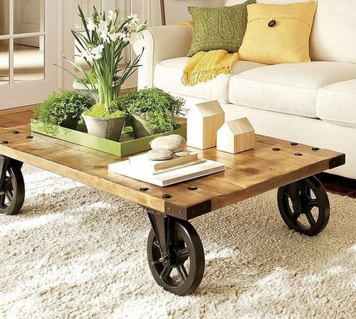 Smooth Cofee Table With Cast Iron Wheels