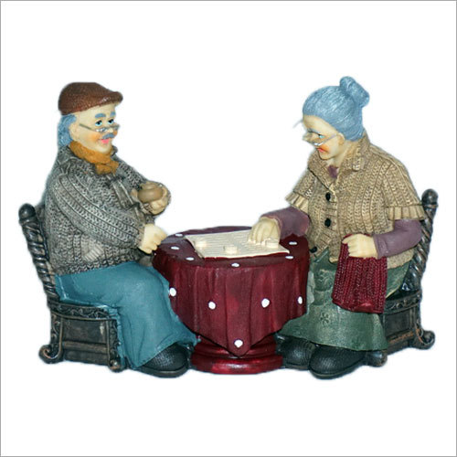 Sitting Old Couple Statue