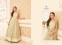 Golden party wear designer dress material