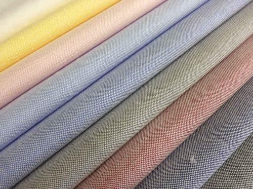 Oxford Plain Shirting Fabric - PC 40:60 Width 58 inches Multicolour Plain Plaid 142 GSM Weight | Features: Colourfastness Washable