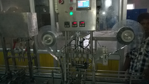 Flavoured Milk Bottle Filling and Induction Sealing Machine