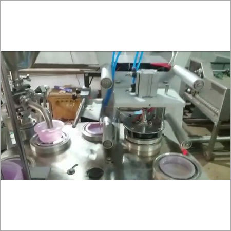 Rotary Cup Filling & Sealing Machine Rotary Cup Filling & Sealing Machine
