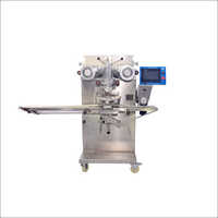 Encrusting Machine