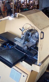 Bar/pipe parting machine with OD turning