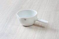 Casserole with porcelain handle