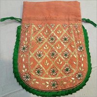 Ethnic Ladies Potli Bag - Premium Raw Silk, 12x12 Inches, Orange And Green Color, Embellished With Gota Patti, Beads, And Stones, Stylish Handle For Women