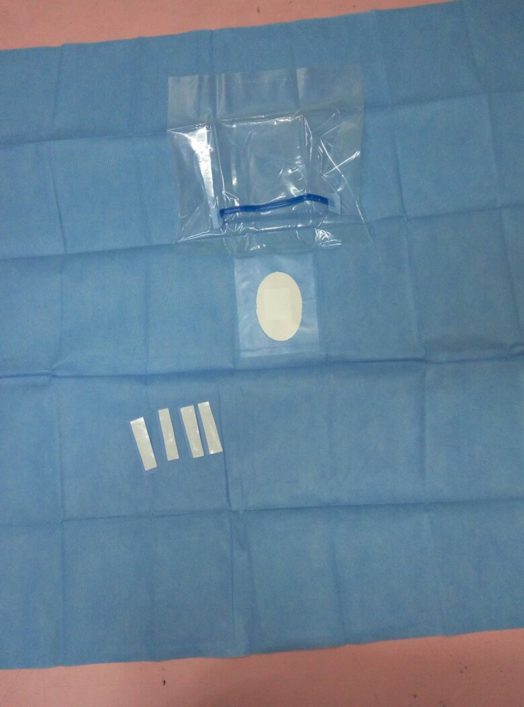 Eye Drape With Pouch & Adhesive Stripes