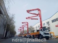 Truck Mounted Concrete Pump - 125 m3/h Output , 8.5 Mpa Pressure , Red Color , 700 L Bucket Volume , 8830 mm Boom Length , 34.7 m Max. Operation Radius , 38.7 m Max. Operation Height , 29000 kg Total Weight , HOWO ZZ5307N4647C Chassis Model