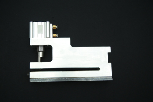 Pneumatic half-moon cut punch