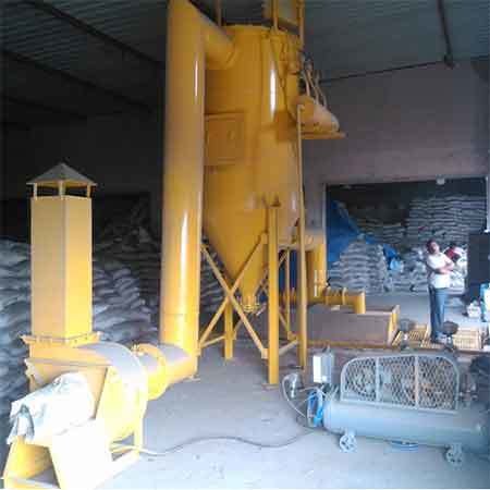 Dust extarcting system for cement bag cutting hopper