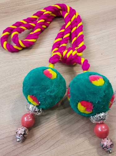 Pom pom beaded tieback