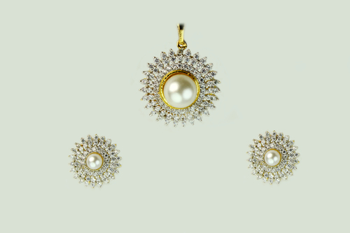 Punjabi Tadka Glamour Pendant Set - Brass Alloy Medium Pearl Drop Dual Tone Finish | Embellished with Cubic Zircons Lobster Clasp Closure Matching Stud Earrings