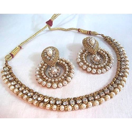Beautiful Elegant Pearl Stone Necklace Set - Alloy Material, Golden Color | Features Jhumka, Lightweight Design, Enhances Traditional and Casual Attires