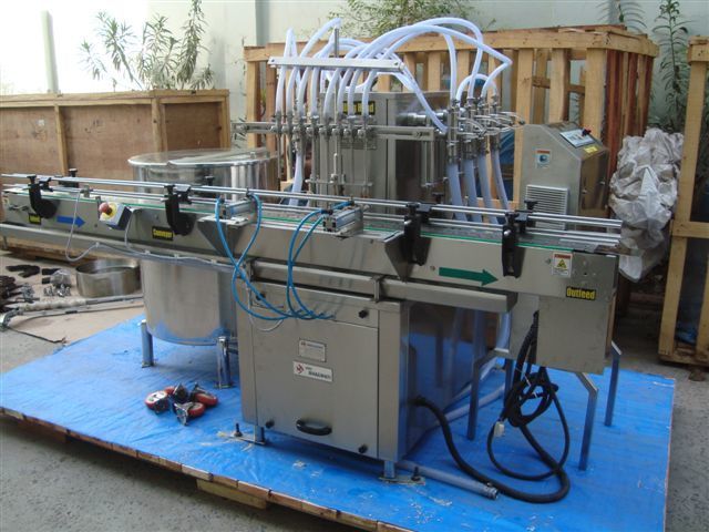 Volumetric Linear Bottle Filling Machine