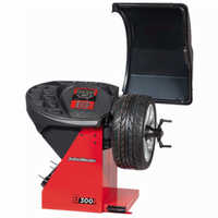 Semi Automatic Wheel Balancing Machine - 1313x868x1834 Mm, 120 Kg Weight | 200 Rpm Speed, 1 Gm Accuracy, Red & Black Design