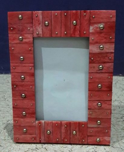 Bone studded photo frame