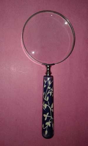 Magnifying glass with resin designed handle