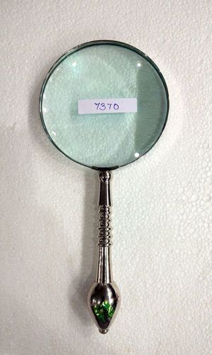 Magnifying glass with brass designed handle